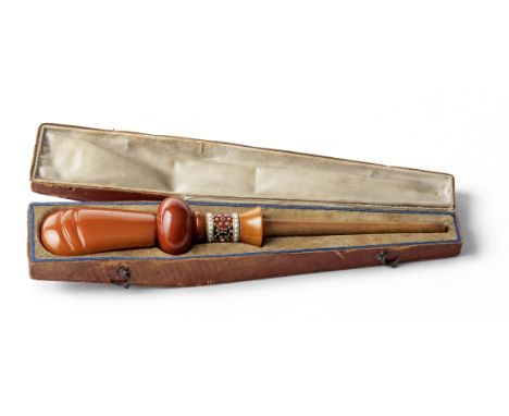 An amber mouthpiece with enamelled-gold mount for the Ottoman Market Europe, 19th Centurycomprising four amber elements and a