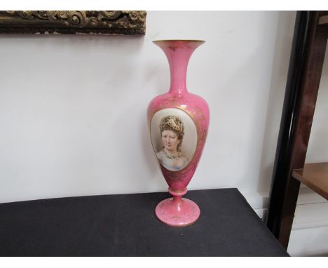 A Victorian overlay glass vase with painted portrait and gilt embellishment, 47.5cm tall