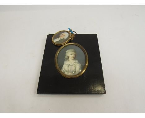 Two miniature portraits, JAMES SCOULET (FL 1769-1787): A late 18th early 19th Century miniature on ivory of young gentleman i