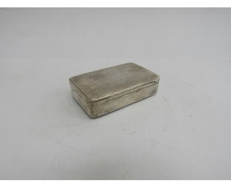 A 19th Century Continental silver box with engine turned detail, monogrammed interior, 7.5cm long, 50g