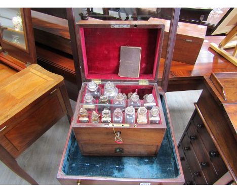 A mahogany campaign travelling medical box with contents, scales and weights, bottles etc 