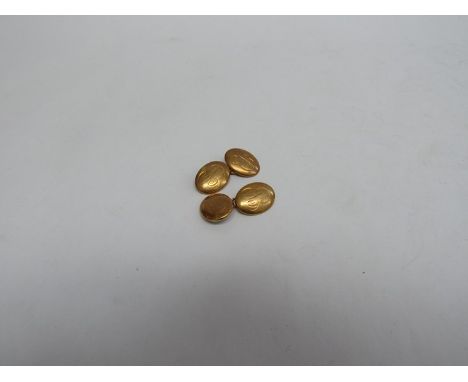 A pair of 18ct gold cufflinks with monogrammed fronts, 13g