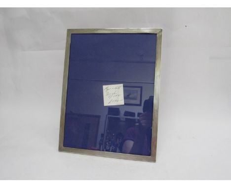 A Mappin &amp; Webb silver photograph frame with engine turned detail, Birmingham 1931, 33cm x 25cm