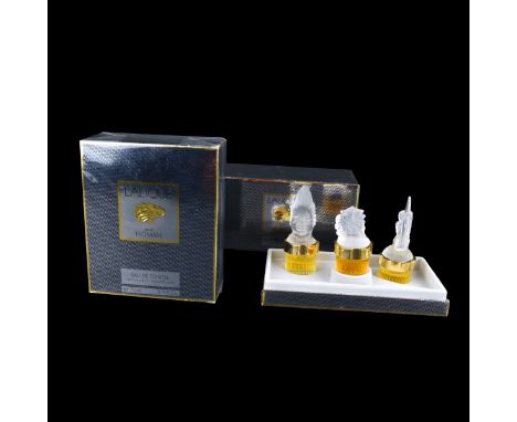 Two (2) Vintage Lalique Fragrances. Includes: Vaporisateur and Les Mascotte miniatures. Vaporisateur is 75 ML, Masccottes set
