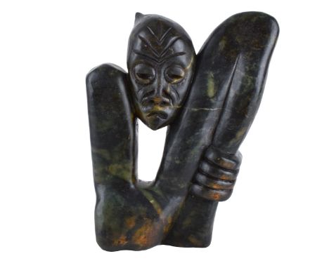 Carved Stone Figural Shona Sculpture. Unsigned. Measures 10-3/4" H. Condition: Light scuffs. Domestic Shipping: $48.00 Min Es