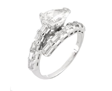 Vintage Approx. 2.25 Carat TW Diamond and Platinum Bypass Ring. Set with a 1.50 carat pear shape diamond J color, SI2-I1 clar