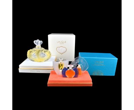 Two (2) Vintage Lalique Fragrances. Includes: Lalique France "Duex Coeurs" perfume in original box and Les Introuvables minia