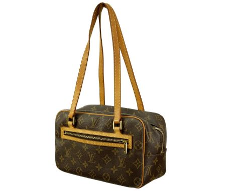 Louis Vuitton Brown Canvas Monogram Cite MM Bag. Golden brass hardware, brown interior with patch pockets, vachetta handles. 