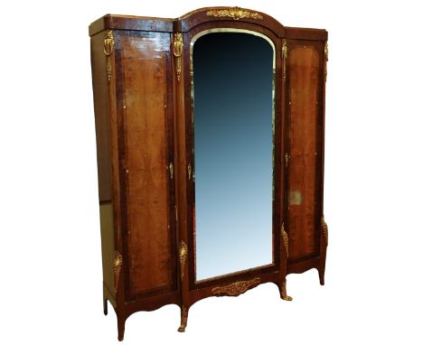 19/20th Century French Burlwood Three Door Armoire with Gilt Bronze Fittings. Decorated with a large mirrored fitted door fla