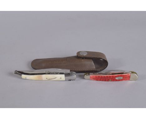 A W R CASE FOLDING KNIFE AND A LAGULOLE BONE KNIFE in a leather sheath (2)