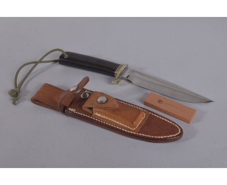 A RANDALL ORLANDO HUNTING KNIFE 10.5Ins long  in a leather case.