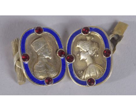 A PAIR OF RUSSIAN SILVER AND BLUE ENAMEL PORTRAIT HEAD CUFFLINKS.