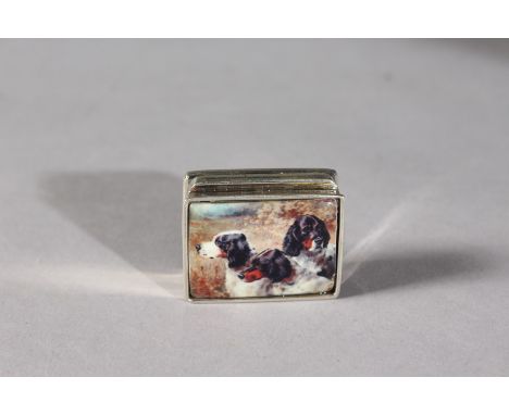 A SILVER THREE DOG ENAMEL PILL BOX.