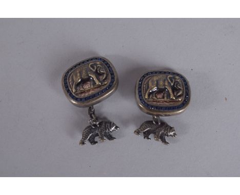 A PAIR OF RUSSIAN SILVER AND BLUE ENAMEL ELEPHANT CUFFLINKS