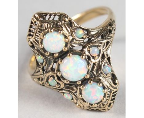 A 9CT GOLD OPAL SET RING.