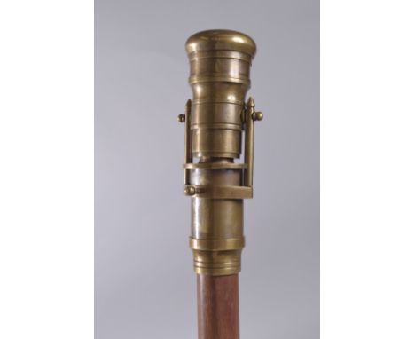 A WALKING STICK WITH TELESCOPE HANDLE.