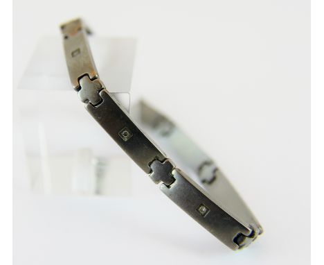 Titanium and diamond bracelet