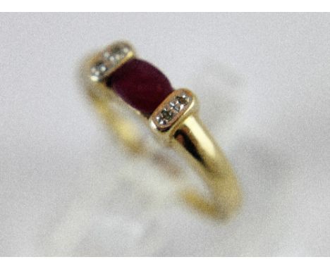 9 ct gold ruby & diamond ring. Size M.