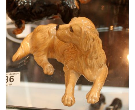 Three Royal Doulton dogs includng Dachsund Shrewd Saint, Welsh Corgi Spring Robin and Labrador and pup, model numbers; HN1128