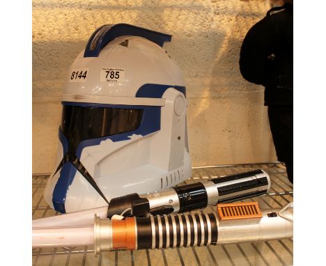 Star Wars Troopers helmet and two light sabres 