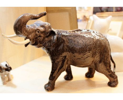 Beswick elephant trunk in salute, model number 1770. H: 30 cm