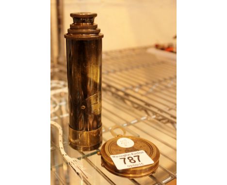 A brass compass and a brass telescope