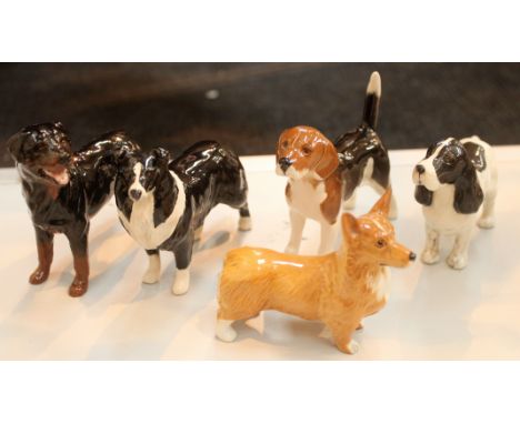 Five Beswick dogs including Rottweiler, Cocker Spaniel and Corgi, Sheepdog and Beagle, model numbers; 3260, 1754, 1854, 1939 