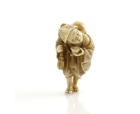 A stained ivory netsuke carved as a traveller wearing waraji and holding a gourd flask across the shoulder; a sakazuki in the