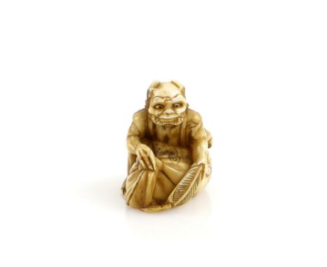 A stained ivory netsuke of Fujin kneeling on his wind sack, signed GyokuminProvenance: The Property of a Lady. From a Private