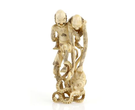 A stained ivory okimono of Ashinaga and Tenaga with an octopus, 11.5 cm high, Meiji PeriodProvenance: The Property of a Lady.