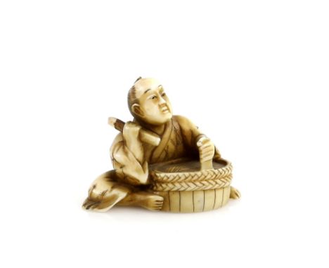 A small ivory okimono of a seated barrel maker, 5cm wide, 20th CenturyProvenance: The Property of a Lady. From a Private Coll