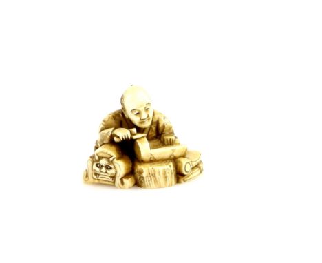 A stained ivory netsuke carved as a roof tile maker, signed GyokuzanProvenance: The Property of a Lady. From a Private Collec