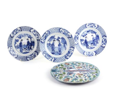 Three Chinese blue and white dishes decorated with Manchu/Chinese 'Long Elizas', each dish with underglaze blue six character
