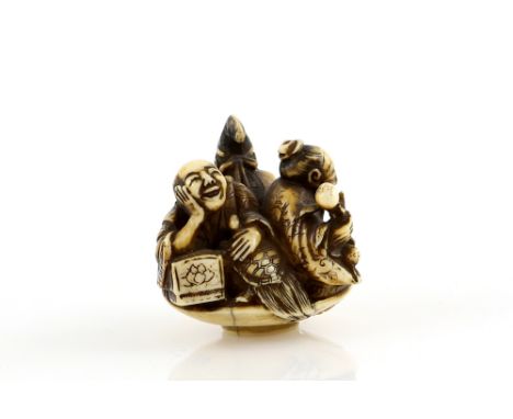 An ivory netsuke of three men in a massive sakazuki, possibly in a parody of The Three Sake Tasters, two kanji on the base, 1