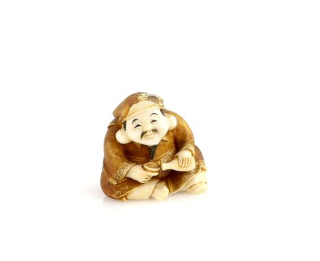 A heavily stained ivory netsuke of Daikoku pouring sake from a tokkuri into a sakazuki, signed Kozan, 20th CenturyProvenance: