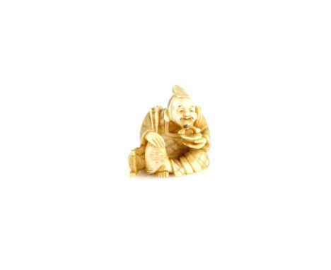 A stained ivory netsuke carved as Ebisu holding a sakazuki with his left hand, 20th CenturyProvenance: The Property of a Lady