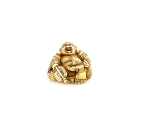 An ivory netsuke of Hotei seated with a fan beside a boy, signed TomoyukiProvenance: The Property of a Lady. From a Private C