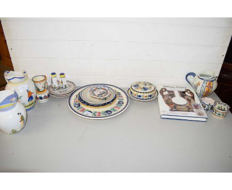 MIXED LOT : ASSORTED QUIMPER JUGS, PLATES AND OTHER ITEMS PLUS A GUIDE BOOK TO THE POTTERY