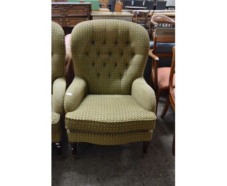 20TH CENTURY BUTTON BACK ARMCHAIR, UPHOLSTERED IN CHEQUERED FABRIC, RAISED ON TAPERING LEGS WITH BRASS CASTERS
