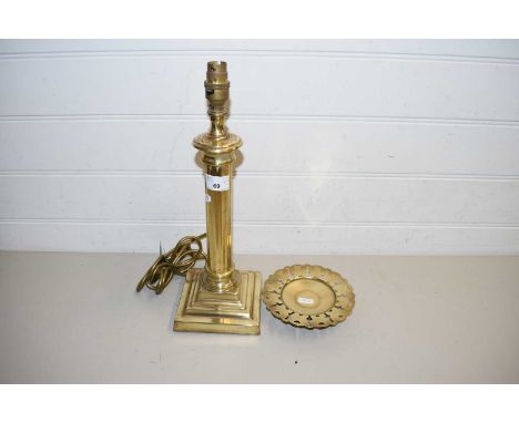 BRASS TABLE LAMP AND A BRASS PEDESTAL DISH (2)
