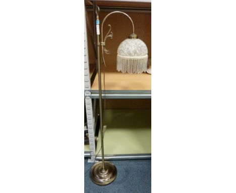 Floor lamp with fringed shade