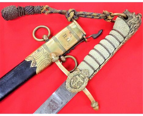 1920’s era British Royal Navy midshipman’s sword/dirk and scabbard by Wilkinson &amp;amp; Gieves of London. Lion head hilt wi