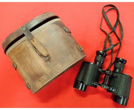 WW2 British Air Ministry binoculars in leather case with etched name. Marked 6E/471 over crown A. M. (air ministry) stamped b