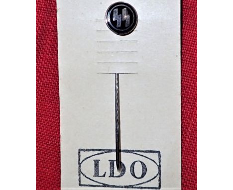 WW2 German SS stick pin on L.D.O. card. White metal knurled pin and round head, with enamel S.S. to face. Pin is held by card