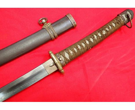 1930’s era type 98 Japanese Army officer’s sword and scabbard with distinctive hamon blade. Features standard officer’s type 