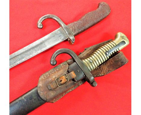 Lot of 1866 pattern French Chassepot Yataghan sword bayonets (2). Features solid brass ribbed hilt with working spring steel 