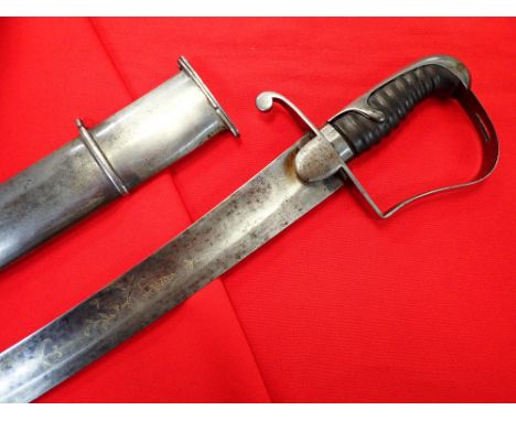 1796 pattern British Army engraved light cavalry officer’s sword and scabbard. Wide bow guard with leather wrapped wooden gri