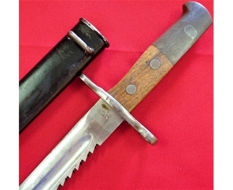 WW1 1914 pattern Swiss Army pioneer 'Sawback' bayonet with scabbard. Features nickel steel fittings, showing birds head pomme