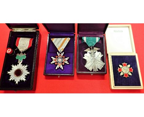 Lot of Japanese medals &amp;amp; awards (27). Order of the rising sun, 5th Class in box; Sacred treasure, 5th Class; Golden K