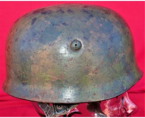 Scarce WW2 German Air Force single decal camouflage M38 paratrooper’s steel helmet.Model 1938 steel helmet, with single Luftw